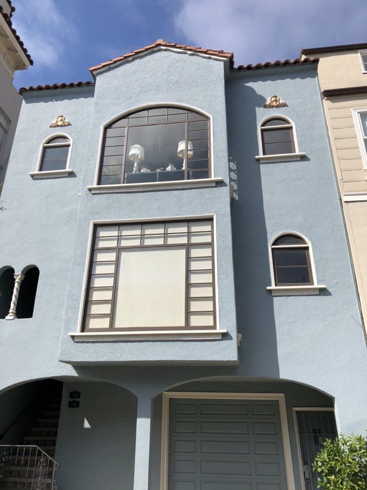 Arched Windows on Stucco — Window Replacement by Golden State Windows in the San Francisco Bay Area